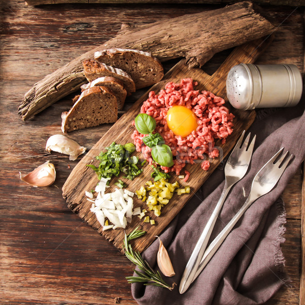 beer snack Beef tartare with pickled cucumber  Stock photo © Naltik