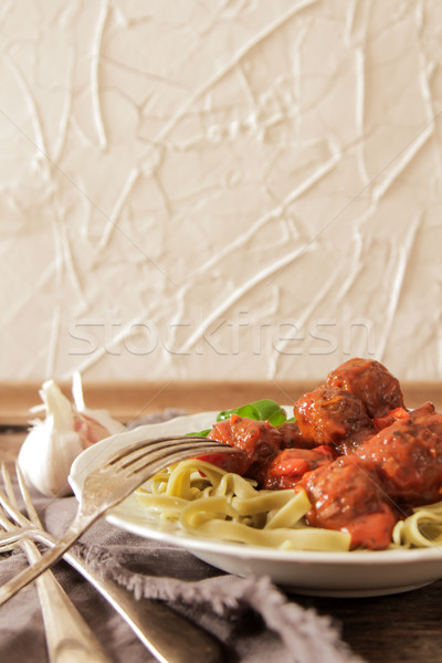 Stock photo: meatballs, tomato sauce in the Tagliatelle and basil 