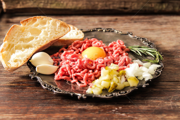 beer snack Beef tartare with pickled cucumber  Stock photo © Naltik