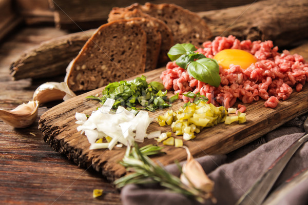 beer snack Beef tartare with pickled cucumber  Stock photo © Naltik