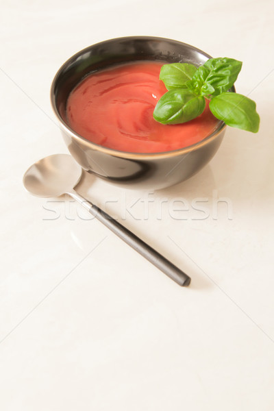 Stock photo: tomato soup in a black mask with gold edge