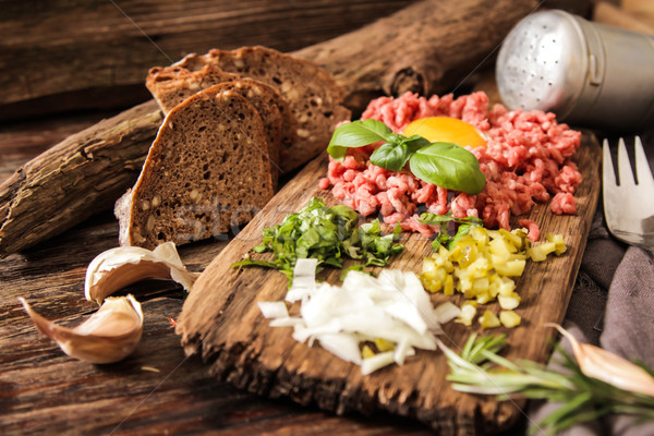 beer snack Beef tartare with pickled cucumber  Stock photo © Naltik