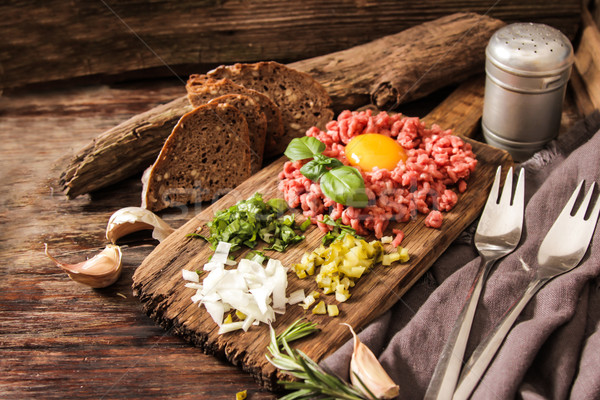 beer snack Beef tartare with pickled cucumber  Stock photo © Naltik