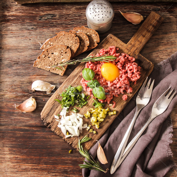 beer snack Beef tartare with pickled cucumber  Stock photo © Naltik