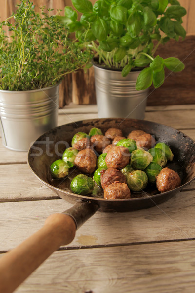 meatballs with cabbage and basil in a pan Stock photo © Naltik