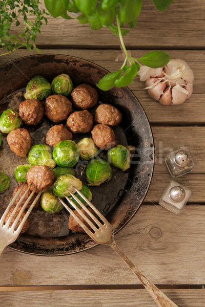 meatballs with cabbage and basil in a pan Stock photo © Naltik