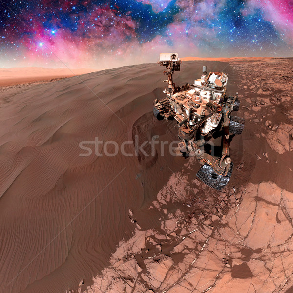 Curiosity rover exploring the surface of Mars. Stock photo © NASA_images