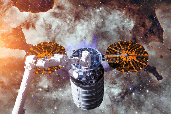 Stock photo: Cargo spacecraft - The Automated Transfer Vehicle over nebula.