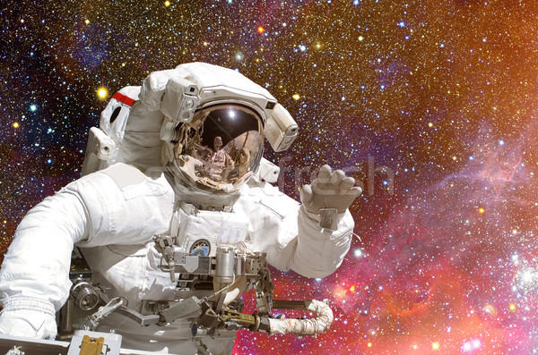 Astronaut in outer space against the backdrop of the outer space. Stock photo © NASA_images