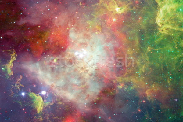 Nebula and stars in outer space. Elements of this image furnished by NASA. Stock photo © NASA_images