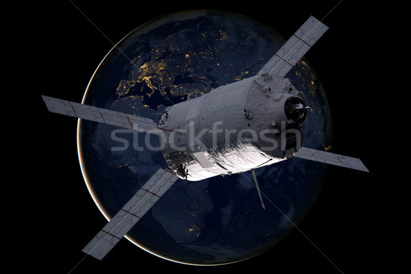 Cargo spacecraft - The Automated Transfer Vehicle over the planet Earth. Stock photo © NASA_images