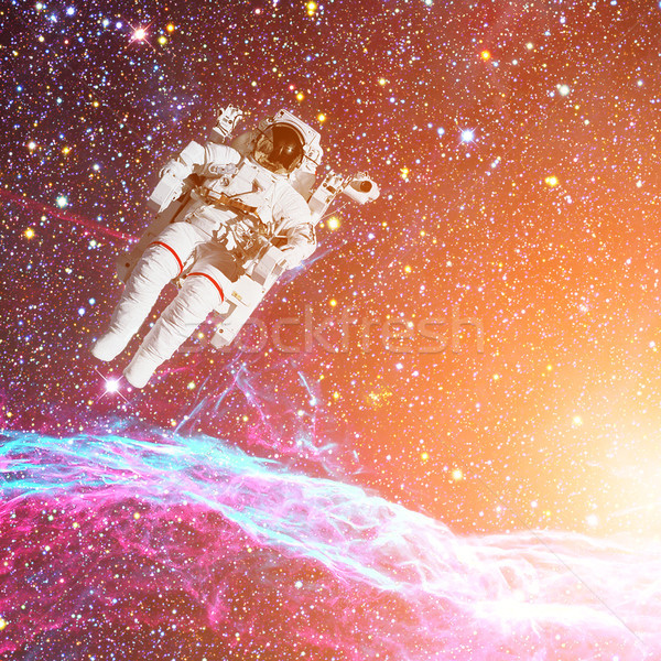 Foto stock: Astronauta · espaço · exterior · nebulosa · elementos · imagem · homem