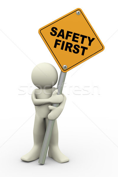 3d man with safety first sign board Stock photo © nasirkhan