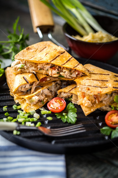 Mexican food quesadilla with grilled chicken, salsa and cheese Stock photo © Natalya_Maiorova