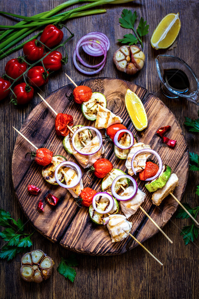 Gegrilde kip courgette tomaten uien kruiden houten Stockfoto © Natalya_Maiorova