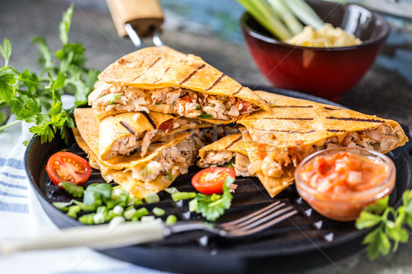 Mexican food quesadilla with grilled chicken, salsa and cheese Stock photo © Natalya_Maiorova