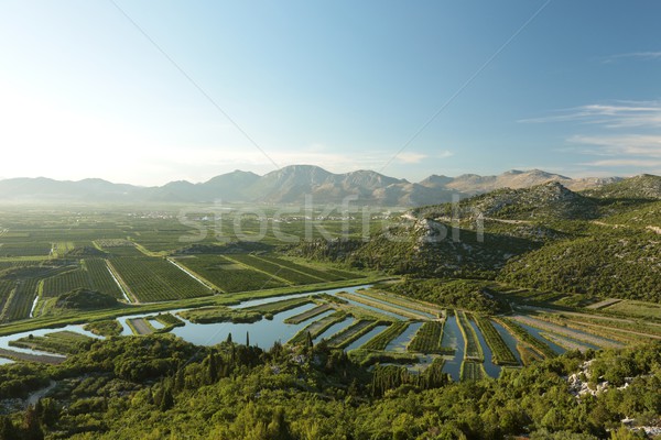 Vale Croácia montanhas crepúsculo água pôr do sol Foto stock © nature78