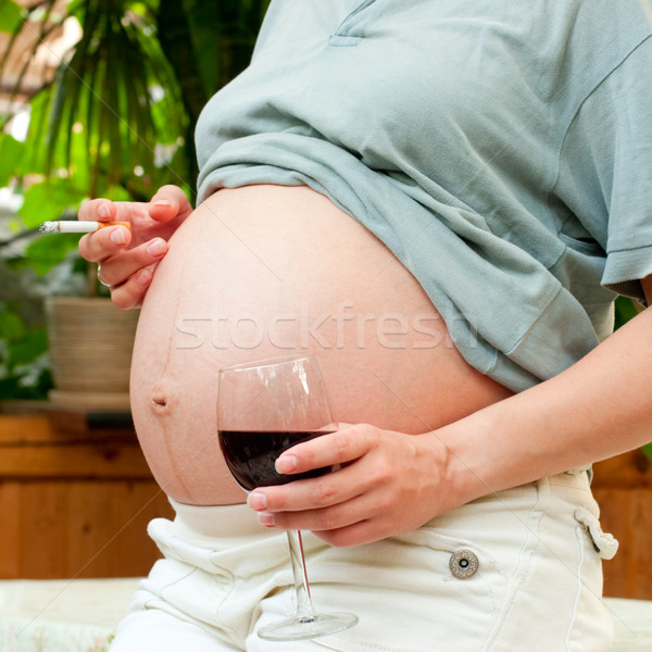 Zararlı bağımlılık genç hamile kadın şarap Stok fotoğraf © naumoid