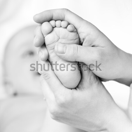 Foot massage Stock photo © naumoid