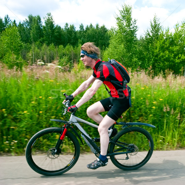 Moving cyclist Stock photo © naumoid