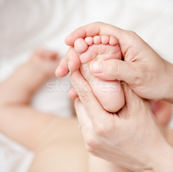Foot massage Stock photo © naumoid