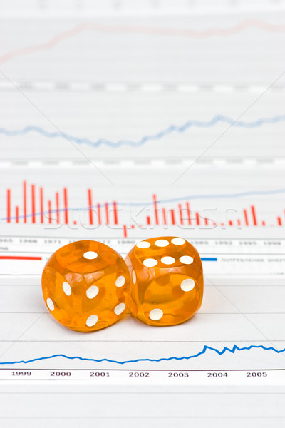 Amber dice on figures Stock photo © naumoid