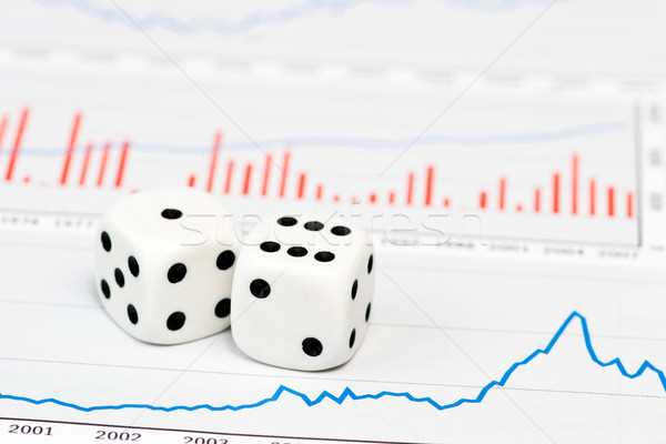 Dice on figures Stock photo © naumoid