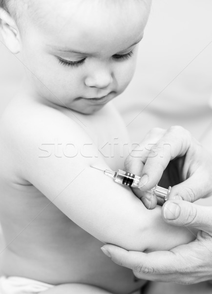 Little baby get an injection Stock photo © naumoid