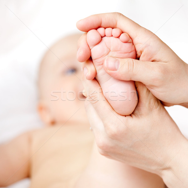 Fuß Massage Mutter seicht Schwerpunkt Stock foto © naumoid