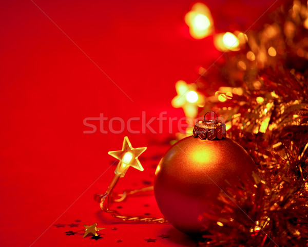 Natal decoração dourado bugiganga luzes vermelho Foto stock © naumoid