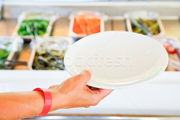 Stock photo: Hand with plate