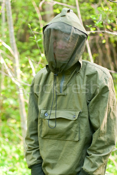 Man in encephalitis protective clothing Stock photo © naumoid