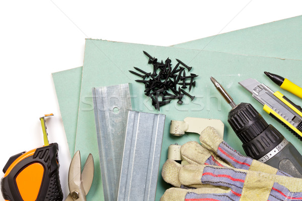 Placoplâtre outils métal gants blanche Photo stock © naumoid