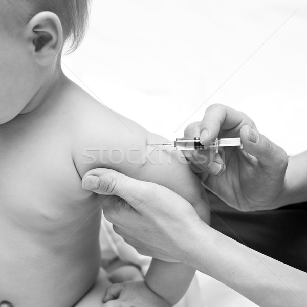 Little baby get an injection Stock photo © naumoid