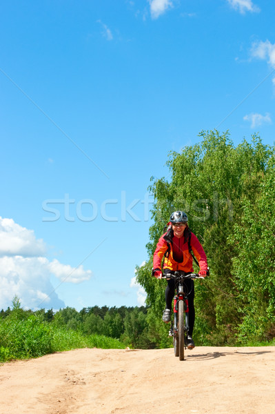 Travelling cyclist Stock photo © naumoid
