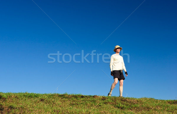 Hiker on a hill Stock photo © naumoid