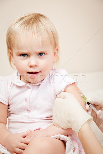 Little girl gets an injection Stock photo © naumoid