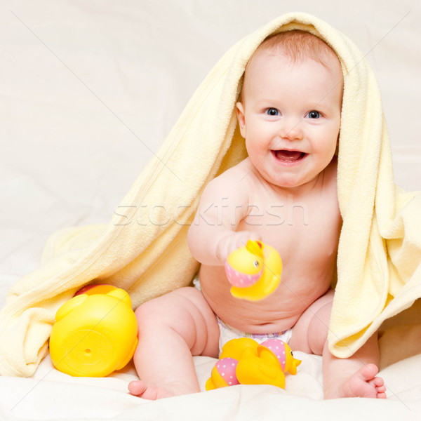 Infant with rubber duck Stock photo © naumoid
