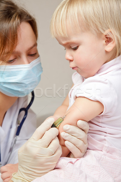 Küçük enjeksiyon doktor çocuk kol Stok fotoğraf © naumoid
