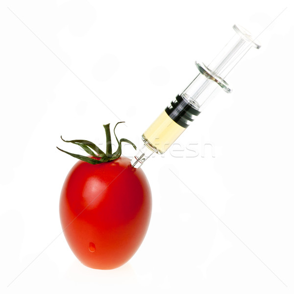Tomato with syringe Stock photo © naumoid