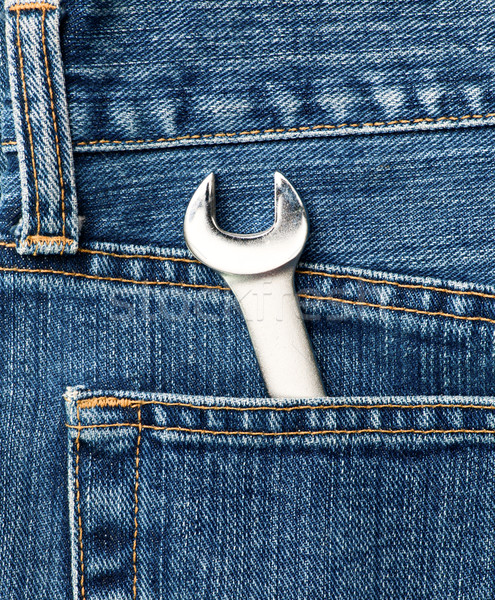 Stock photo: Lug wrench in a pocket