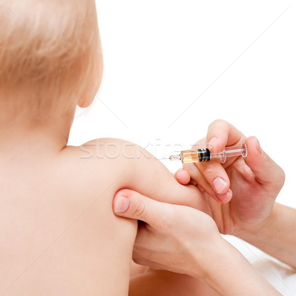 Weinig baby injectie arts kind arm Stockfoto © naumoid