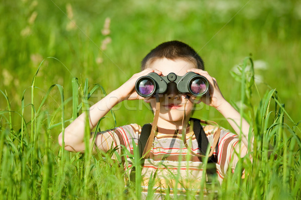 Stock photo: Kid with binocular