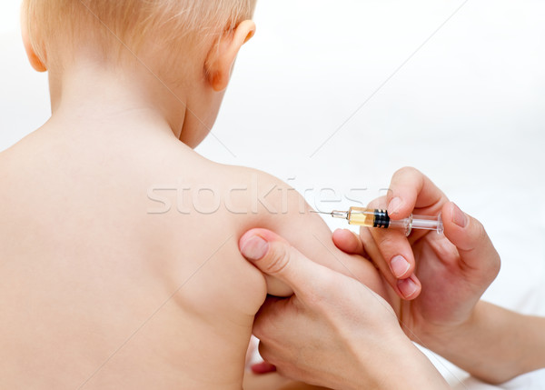 Weinig baby injectie arts kind arm Stockfoto © naumoid