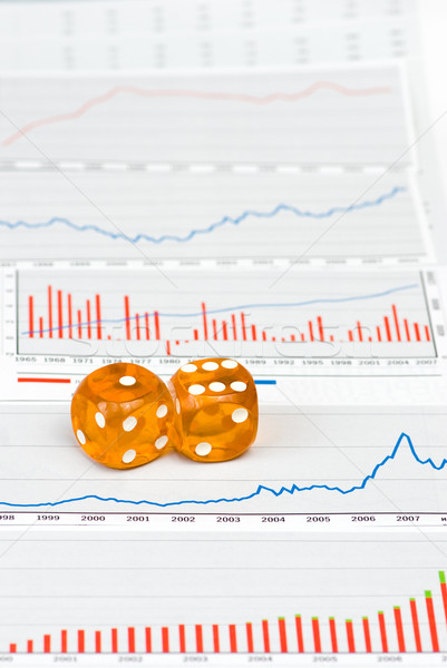Amber dice on figures Stock photo © naumoid