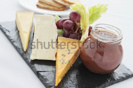 Brânză alimente tabel albastru cină struguri Imagine de stoc © neillangan