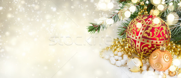 Stock photo: christmas red and golden heart with evegreen tree 