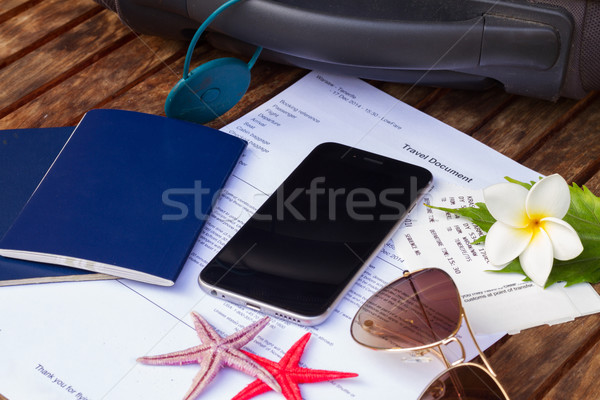 путешествия документы чемодан черный смартфон деньги Сток-фото © neirfy