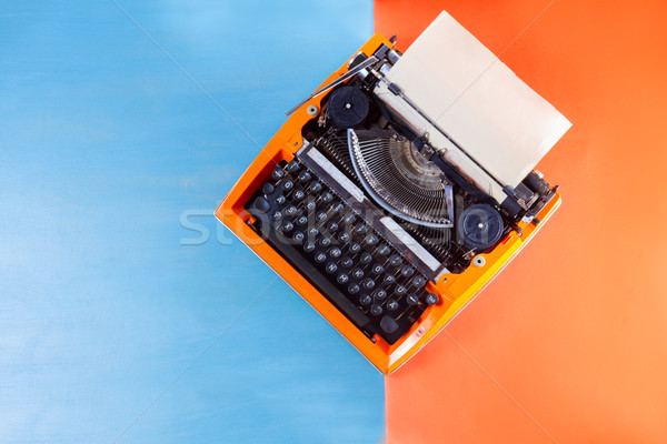 Workspace with vintage orange typewriter Stock photo © neirfy