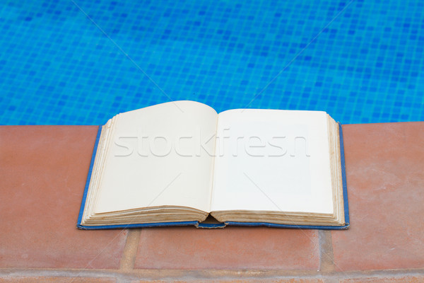summer reading near pool Stock photo © neirfy